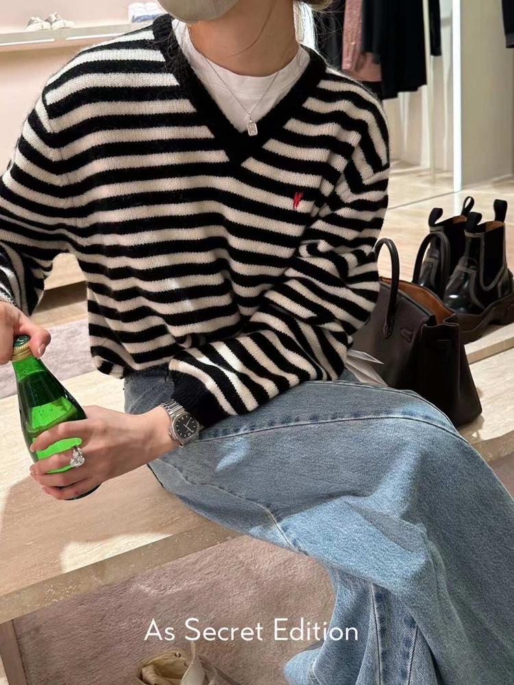 天津市滨海新区禧米服装店