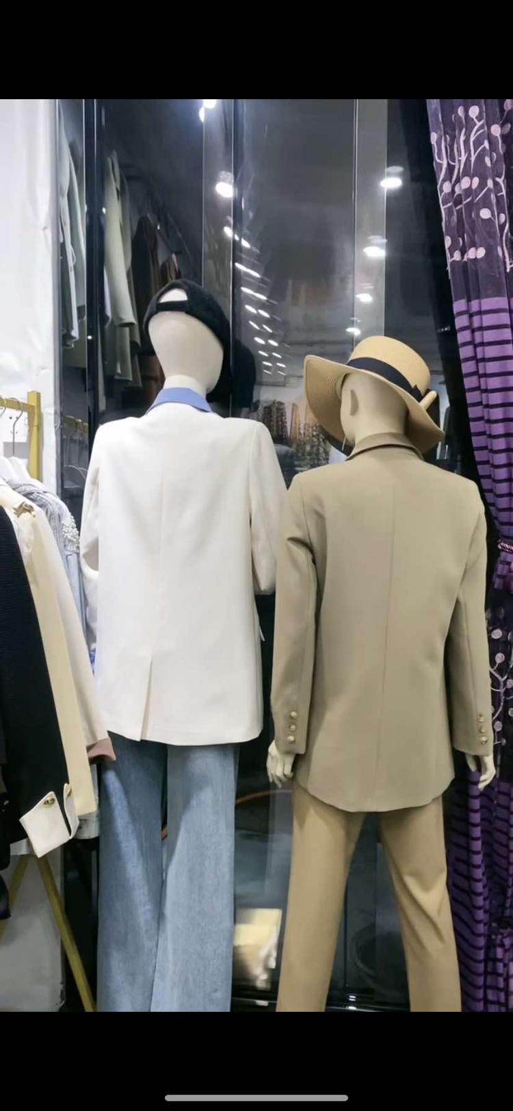 思南县亭子坝镇梁凤服装店的小店